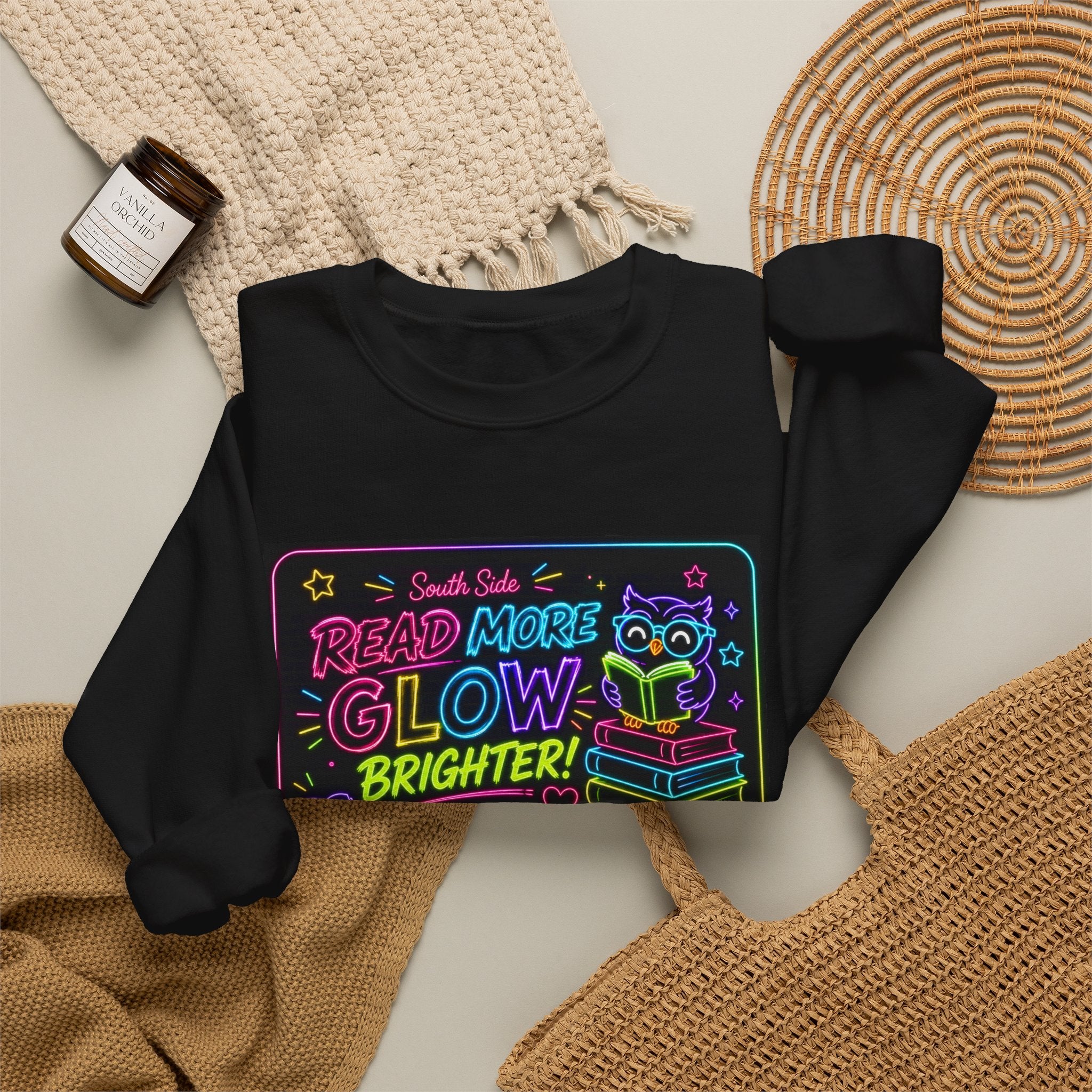 Crewneck Sweatshirt — "Read More, Glow Brighter" Neon Bookworm Graphic